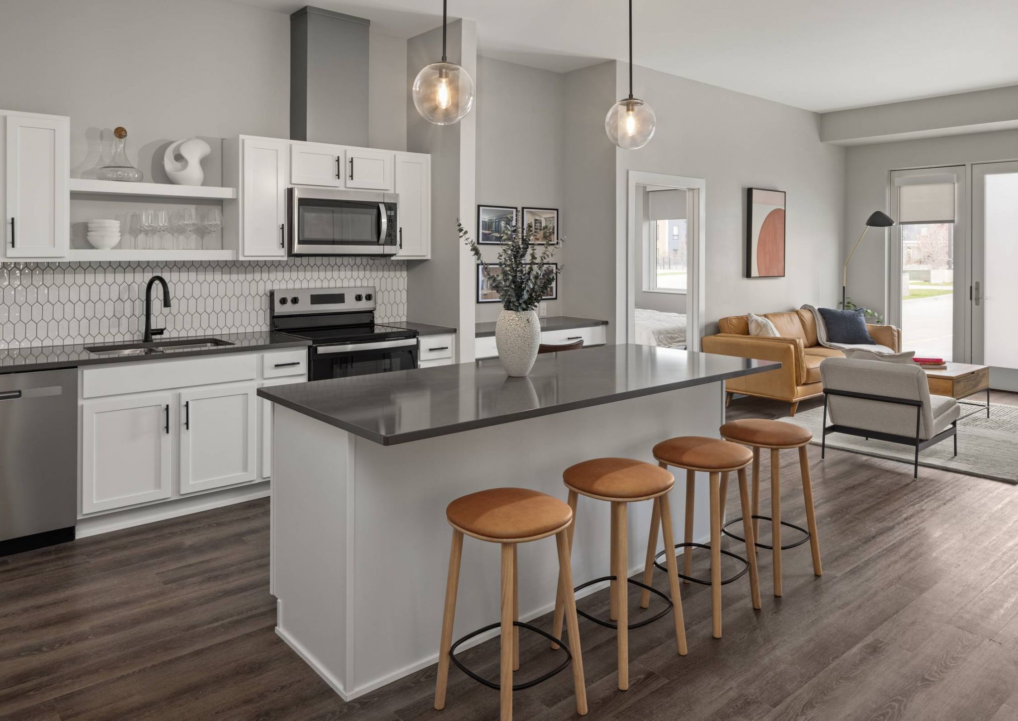The Meridian apartments spacious kitchen with island countertops with bar seating and ample cabinet space